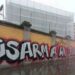 Corteo per Dax, murales ‘Disarmiamo la paura’ su una caserma